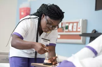 Nursing student in a lab