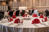 Tables set up for event in Alumni Room