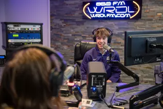 photo of students on air at WRDL radio station