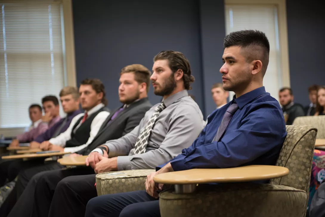 Students listening to a presentation at Career Day