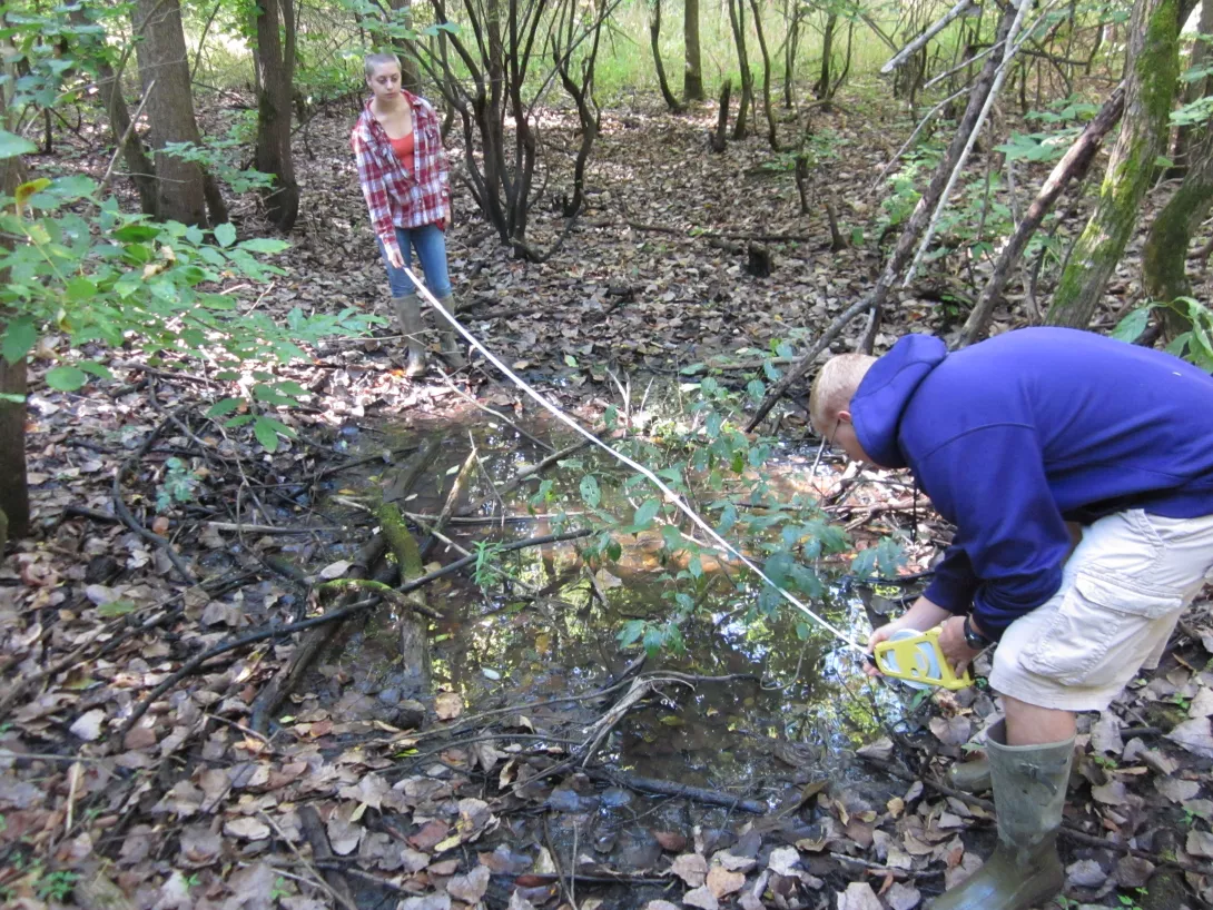 Students taking measurements at Black Fork Wetlands