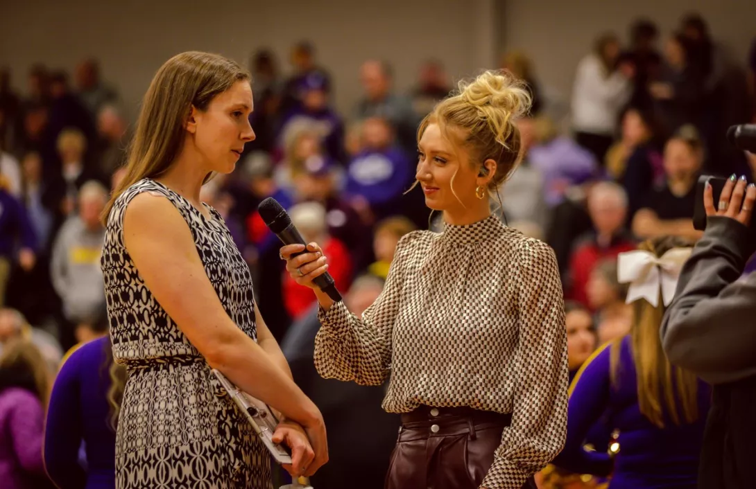 Mackenzie Pflum interviewing Kari Pickens, AU women's basketball coach