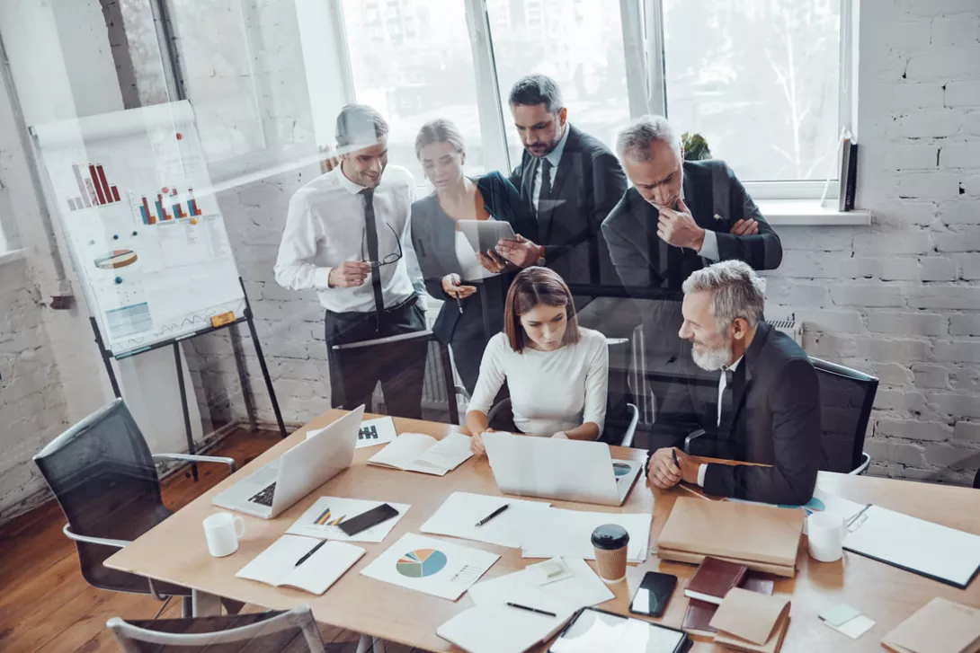 group working around desk