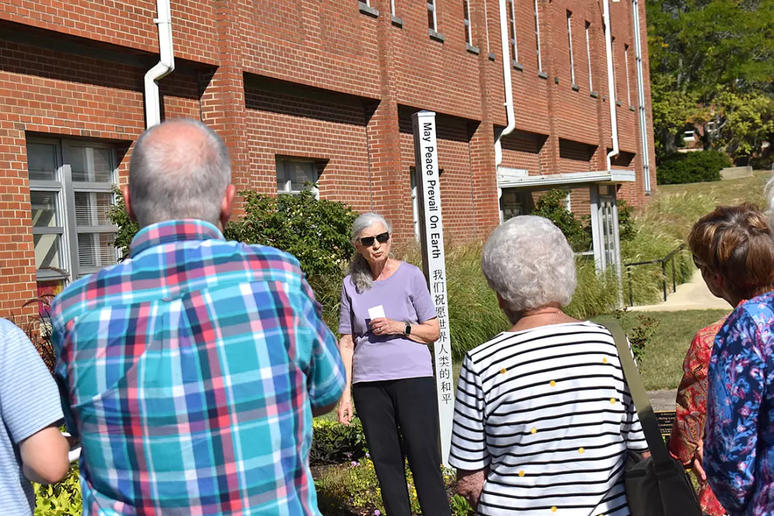 Dorothy Stratton speaks during the Peace Pole dedication